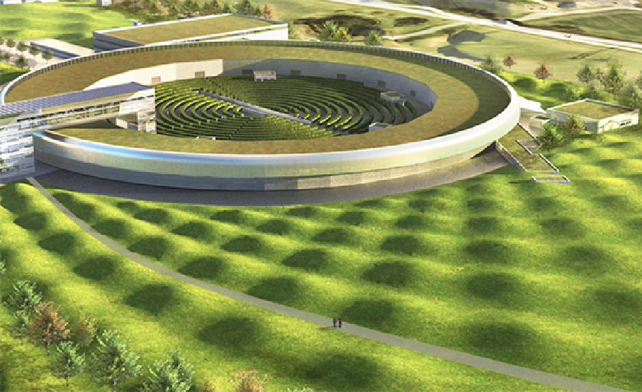 a landscape of a big field with a circular building